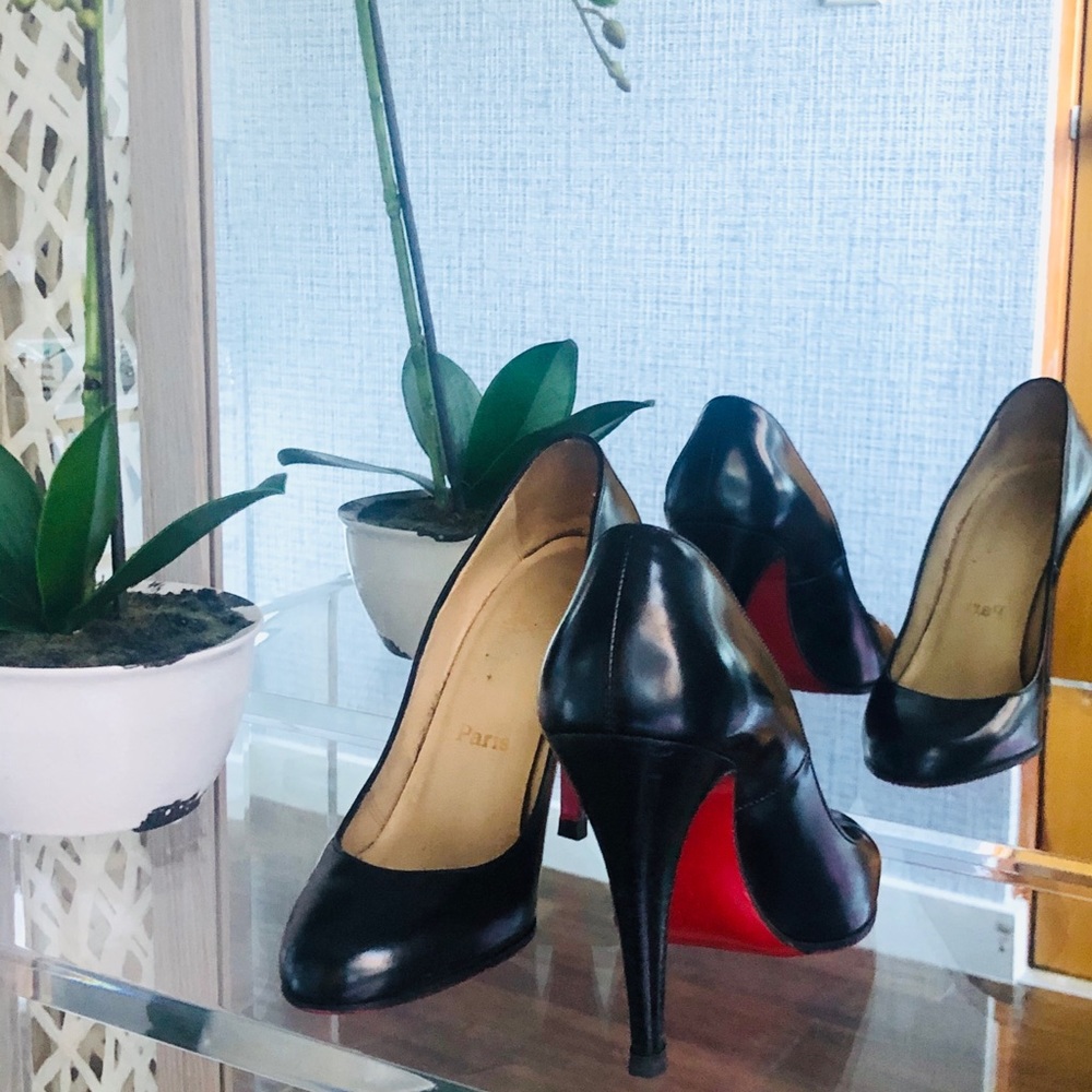 Christian Louboutin round toe pumps